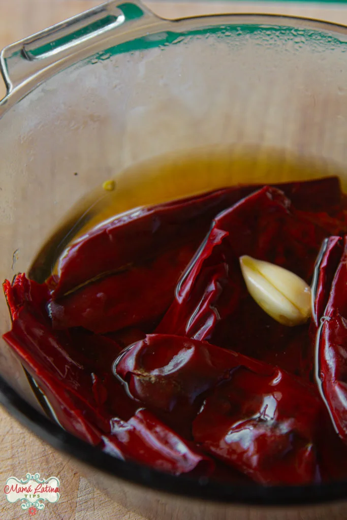 guajllo peppers in water